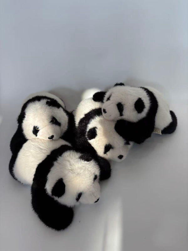 Mini reclining panda doll